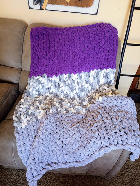 Stripped purple blanket
